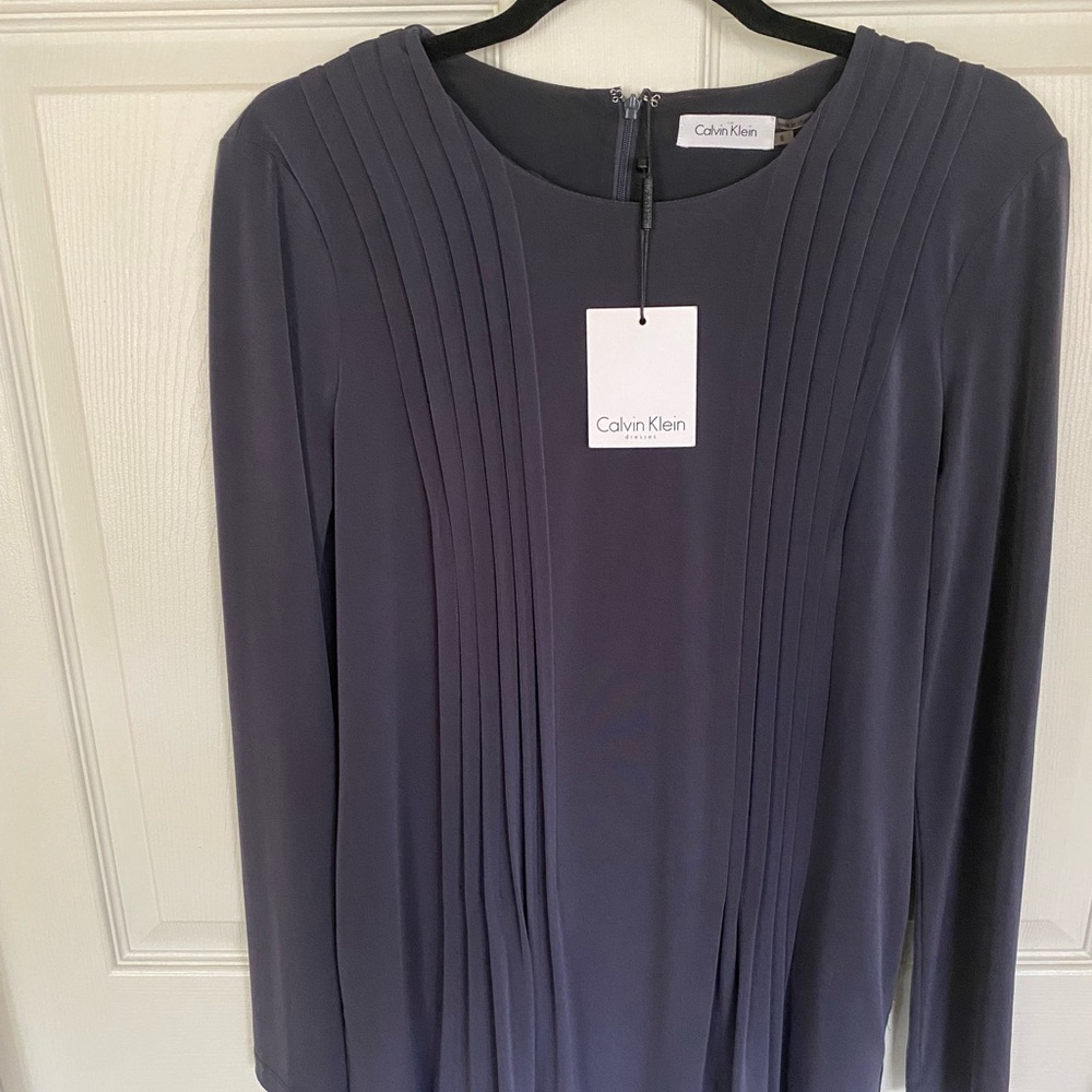 Charcoal Calvin Klein dress. Long sleeves, comfy soft material. NWT. Size 6.